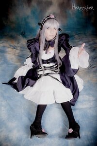 Rating: Safe Score: 0 Tags: 1girl black_footwear black_legwear breasts dress flower hairband high_heels long_hair long_sleeves looking_at_viewer purple_eyes ribbon silver_hair sitting solo suigintou User: admin