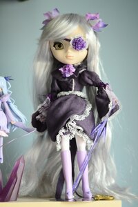 Rating: Safe Score: 0 Tags: 2girls barasuishou boots doll dress eyepatch flower frills long_hair multiple_girls purple_flower solo standing yellow_eyes User: admin