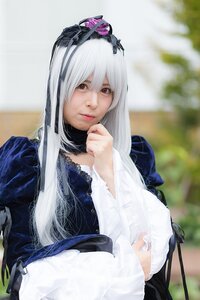 Rating: Safe Score: 0 Tags: 1girl blurry blurry_background depth_of_field dress hair_ornament lips long_hair long_sleeves looking_at_viewer red_eyes solo suigintou torn_clothes upper_body User: admin