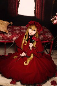 Rating: Safe Score: 0 Tags: 1girl blonde_hair bonnet curtains dress drill_hair flower frills long_hair long_sleeves red_dress red_flower red_rose rose shinku sitting solo User: admin