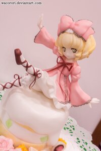 Rating: Safe Score: 0 Tags: 1girl blonde_hair blurry bow depth_of_field doll dress flower food frills hair_bow hina_ichigo hinaichigo long_sleeves pink_bow pink_dress puffy_sleeves short_hair solo striped User: admin