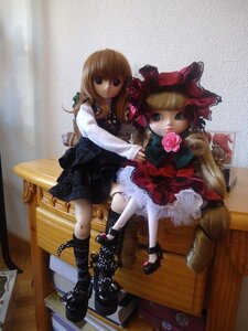 Rating: Safe Score: 0 Tags: 2girls blonde_hair blue_eyes bow chair doll dress flower long_hair looking_at_viewer mary_janes multiple_girls rose shinku sitting solo white_legwear User: admin