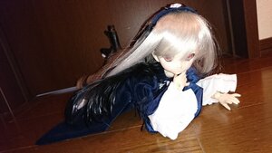 Rating: Safe Score: 0 Tags: 1girl doll dress indoors long_hair long_sleeves red_eyes solo suigintou very_long_hair white_hair User: admin