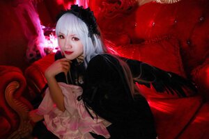 Rating: Safe Score: 0 Tags: 1girl chair frilled_sleeves frills hairband lips lolita_fashion long_hair long_sleeves looking_at_viewer red_eyes rose sitting solo suigintou User: admin