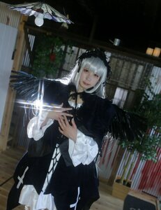 Rating: Safe Score: 0 Tags: 1girl bangs black_dress blurry closed_mouth dress frills gothic_lolita hairband lolita_fashion long_sleeves solo standing suigintou wings User: admin