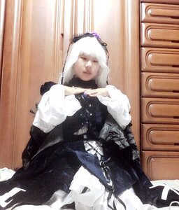 Rating: Safe Score: 0 Tags: 1girl black_dress closed_eyes dress frills gothic_lolita hairband indoors lolita_fashion lolita_hairband long_sleeves sitting solo suigintou white_hair User: admin