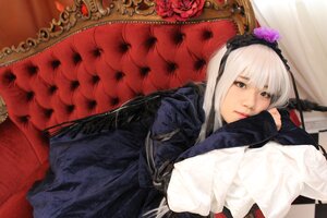 Rating: Safe Score: 0 Tags: 1girl dress flower frills hairband head_rest lips long_hair long_sleeves looking_at_viewer lying on_side red_flower red_rose rose silver_hair solo suigintou wings User: admin