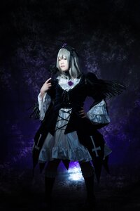 Rating: Safe Score: 0 Tags: 1girl black_dress boots dress frills gothic_lolita lolita_fashion long_hair solo standing suigintou wings User: admin