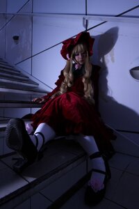 Rating: Safe Score: 0 Tags: 1girl blonde_hair bow doll dress long_hair red_dress ribbon shinku sitting solo User: admin