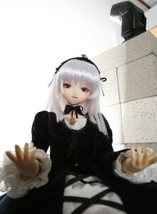 Rating: Safe Score: 0 Tags: 1girl blurry depth_of_field doll dress frills hairband long_hair long_sleeves looking_at_viewer outstretched_arm pink_eyes red_eyes ribbon silver_hair sitting solo suigintou User: admin