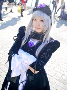 Rating: Safe Score: 0 Tags: 1girl black_dress blurry blurry_background depth_of_field dress flower hair_ornament lips long_hair long_sleeves looking_at_viewer solo solo_focus standing suigintou User: admin