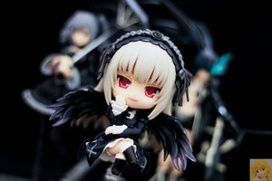 Rating: Safe Score: 0 Tags: 1girl black_dress black_wings blonde_hair blurry blurry_background blurry_foreground depth_of_field doll dress feathered_wings figure frills hairband lolita_fashion lolita_hairband long_hair long_sleeves looking_at_viewer motion_blur red_eyes shinku silver_hair sitting solo suigintou wings User: admin
