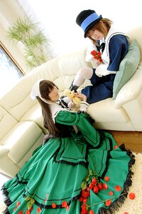 Rating: Safe Score: 0 Tags: 2girls blue_dress brown_eyes brown_hair cake couch dress flower food green_dress hat long_hair long_sleeves multiple_cosplay multiple_girls plant sitting strawberry suiseiseki tagme top_hat User: admin