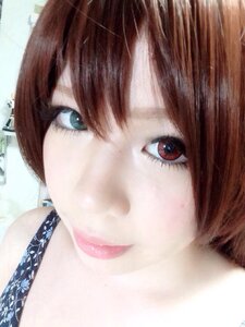 Rating: Safe Score: 0 Tags: 1girl bangs brown_hair face hair_over_one_eye looking_at_viewer portrait red_eyes short_hair solo souseiseki User: admin
