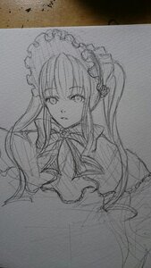 Rating: Safe Score: 0 Tags: 1girl bowtie closed_mouth dress eyebrows_visible_through_hair frills greyscale image long_hair long_sleeves looking_at_viewer monochrome photo shinku sketch solo traditional_media User: admin