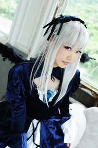 Rating: Safe Score: 0 Tags: 1girl 3d black_dress black_ribbon blurry blurry_background closed_mouth detached_collar dress feathered_wings feathers frills gothic_lolita hairband lips lolita_fashion long_hair long_sleeves photo ribbon silver_hair solo suigintou wings User: admin