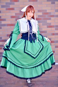 Rating: Safe Score: 0 Tags: 1girl bow brown_hair capelet dress frills full_body green_dress heterochromia long_hair long_sleeves looking_at_viewer pantyhose red_eyes skirt_hold smile solo standing suiseiseki User: admin