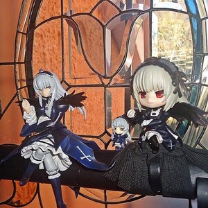 Rating: Safe Score: 0 Tags: 1girl black_wings boots doll dress frills hairband long_hair multiple_girls red_eyes silver_hair sitting solo suigintou wings User: admin