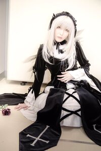 Rating: Safe Score: 0 Tags: 1girl black_dress black_ribbon dress flower frills gothic_lolita hairband long_hair long_sleeves looking_at_viewer ribbon rose silver_hair sitting solo suigintou User: admin