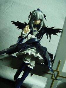 Rating: Safe Score: 0 Tags: 1girl black_wings boots doll dress feathers frills hair_over_eyes hairband long_hair long_sleeves photo ribbon silver_hair solo standing suigintou wings User: admin