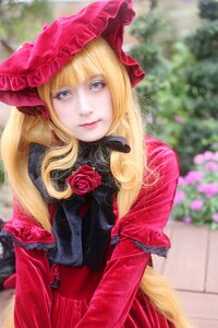 Rating: Safe Score: 0 Tags: 1girl bangs blonde_hair blue_eyes blurry blurry_background bonnet capelet day depth_of_field dress flower gloves lips long_hair looking_at_viewer outdoors photo red_capelet red_dress red_rose rose shinku solo User: admin