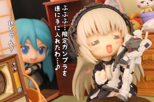 Rating: Safe Score: 0 Tags: 2girls blue_eyes blue_hair blurry blurry_foreground blush chibi depth_of_field doll figure food lolita_hairband long_hair multiple_girls photo solo suigintou User: admin