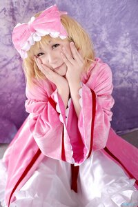 Rating: Safe Score: 0 Tags: 1girl bangs blonde_hair blurry bow depth_of_field dress frills hair_bow hands_on_own_face hinaichigo long_hair long_sleeves looking_at_viewer pink_bow pink_dress realistic smile solo wide_sleeves User: admin