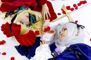 Rating: Safe Score: 0 Tags: 2girls blonde_hair blue_eyes bonnet bow dress feathers flower lips long_hair lying multiple_cosplay multiple_girls petals rose rose_petals shinku suigintou tagme User: admin