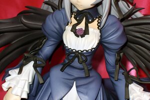 Rating: Safe Score: 0 Tags: 1girl black_wings doll dress flower frills gothic_lolita head_out_of_frame long_hair long_sleeves ribbon rose silver_hair solo suigintou wings User: admin