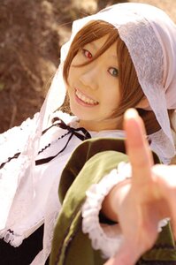 Rating: Safe Score: 0 Tags: 1girl blurry blurry_foreground brown_hair depth_of_field dress foreshortening head_scarf heterochromia looking_at_viewer outstretched_arm smile solo suiseiseki teeth User: admin