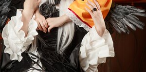 Rating: Safe Score: 0 Tags: 1girl black_dress dress frills gothic_lolita head_out_of_frame jewelry kiss long_hair long_sleeves nail_polish ring simple_background solo suigintou wide_sleeves User: admin