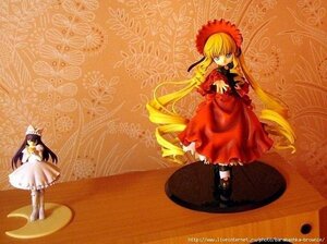 Rating: Safe Score: 0 Tags: 2girls blonde_hair blue_eyes bonnet bow cup doll dress full_body long_hair long_sleeves looking_at_viewer multiple_girls red_dress shinku solo standing twintails very_long_hair User: admin