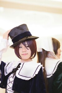 Rating: Safe Score: 0 Tags: 2girls black_dress blurry brown_hair dress hat lips looking_at_viewer multiple_cosplay multiple_girls smile tagme top_hat upper_body User: admin