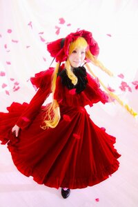 Rating: Safe Score: 0 Tags: 1girl blonde_hair bonnet bow dress long_hair long_sleeves petals red_dress shinku solo striped User: admin