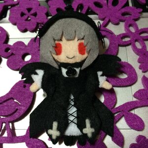 Rating: Safe Score: 0 Tags: 1girl doll dress flower gothic_lolita grey_hair hairband long_hair purple_flower red_eyes smile solo suigintou wings User: admin