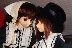 Rating: Safe Score: 0 Tags: 2girls bangs brown_hair doll frills hat lace looking_at_viewer multiple_dolls multiple_girls red_eyes siblings sisters tagme twins User: admin