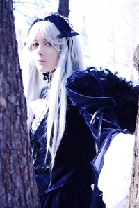 Rating: Safe Score: 0 Tags: 1girl bangs blurry blurry_background closed_mouth depth_of_field dress frills hairband lolita_fashion long_hair long_sleeves ribbon silver_hair solo suigintou very_long_hair white_hair User: admin