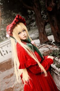 Rating: Safe Score: 0 Tags: 1girl bangs blonde_hair blue_eyes blurry blurry_background bonnet capelet depth_of_field dress long_hair long_sleeves looking_at_viewer outdoors red_capelet red_dress shinku solo standing very_long_hair User: admin