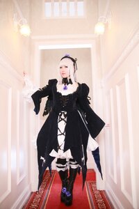 Rating: Safe Score: 0 Tags: 1girl black_dress boots choker dress flower frills gothic_lolita lolita_fashion solo standing suigintou white_hair User: admin