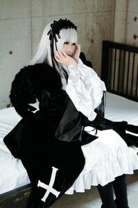 Rating: Safe Score: 0 Tags: 1girl bangs dress frills gothic_lolita hairband half-closed_eyes indoors long_hair long_sleeves red_eyes sitting solo suigintou User: admin