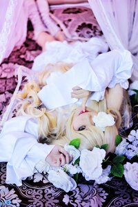 Rating: Safe Score: 0 Tags: 1girl bangs blonde_hair blurry blurry_background blurry_foreground depth_of_field dress flower kirakishou lips long_hair long_sleeves looking_at_viewer lying solo User: admin