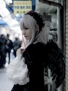 Rating: Safe Score: 0 Tags: 1girl black_dress blurry blurry_background blurry_foreground depth_of_field hairband lips lolita_hairband long_hair long_sleeves outdoors photo solo suigintou wings User: admin