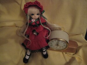 Rating: Safe Score: 0 Tags: 1girl blonde_hair blue_eyes bonnet bow cup doll dress flower hat long_hair long_sleeves red_dress shinku shoes sitting solo very_long_hair User: admin