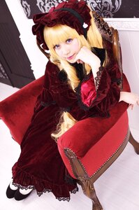 Rating: Safe Score: 0 Tags: 1girl blonde_hair blue_eyes bonnet chair dress drill_hair lace lips lolita_fashion long_hair looking_at_viewer red_dress shinku sitting solo twintails User: admin