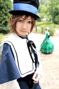 Rating: Safe Score: 0 Tags: 1girl blue_dress blue_headwear blurry blurry_background brown_eyes brown_hair closed_mouth depth_of_field hat long_sleeves looking_at_viewer multiple_cosplay outdoors ribbon short_hair smile solo tagme User: admin