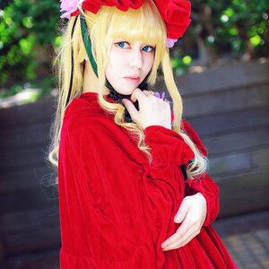 Rating: Safe Score: 0 Tags: 1girl bangs blonde_hair blue_eyes blurry blurry_background depth_of_field flower hair_flower hair_ornament lips long_hair looking_at_viewer red_dress shinku solo upper_body User: admin