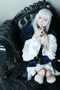 Rating: Safe Score: 0 Tags: 1girl boots doll_joints dress flower gothic_lolita hair_ornament lolita_fashion long_hair long_sleeves own_hands_together sitting solo suigintou white_hair User: admin