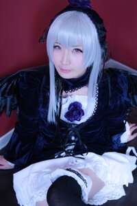 Rating: Safe Score: 0 Tags: 1girl bangs black_legwear closed_mouth dress frills gothic_lolita lips lolita_fashion long_hair long_sleeves looking_at_viewer rose sitting solo suigintou thighhighs User: admin