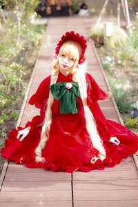 Rating: Safe Score: 0 Tags: 1girl blonde_hair blue_eyes blurry capelet christmas depth_of_field dress flower photo red_capelet red_dress shinku sitting solo User: admin