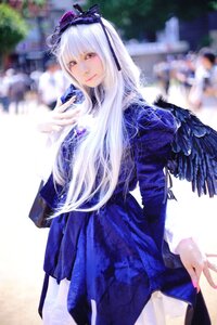 Rating: Safe Score: 0 Tags: 1girl blurry blurry_background depth_of_field dress feathers hairband long_hair long_sleeves looking_at_viewer nail_polish red_eyes smile solo suigintou wings User: admin